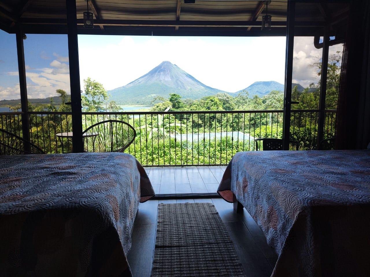 Balcony view of Lake Arenal and volcano
